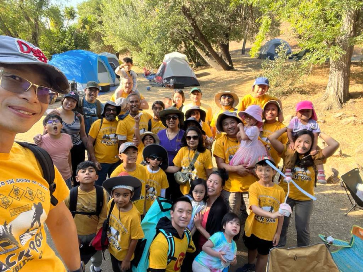 Pack 986 families at a camping trip with tents