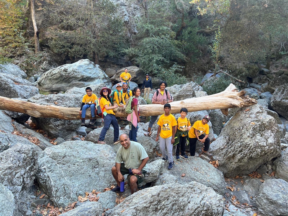 Pack 986 scouts hiking on rocky terrain