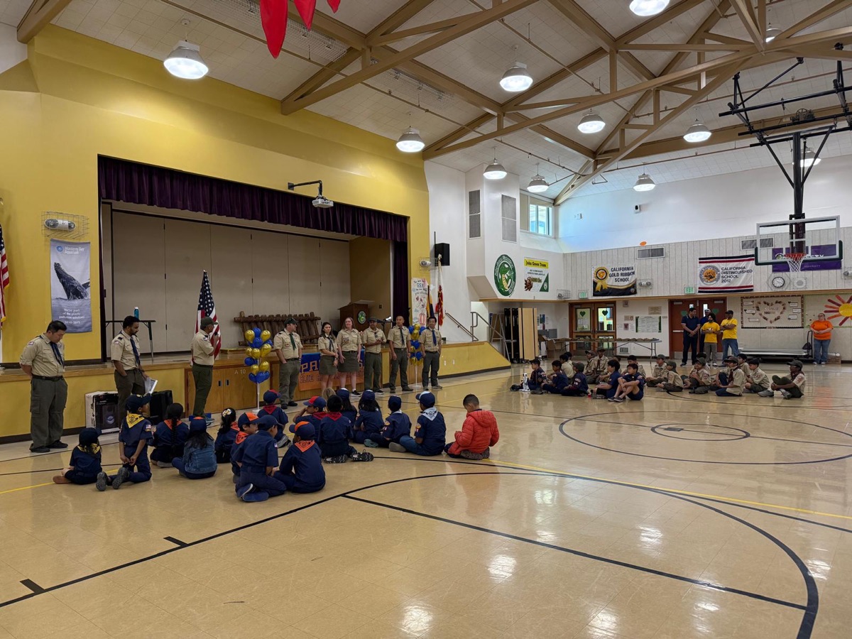 Pack 986 meeting in a school gymnasium