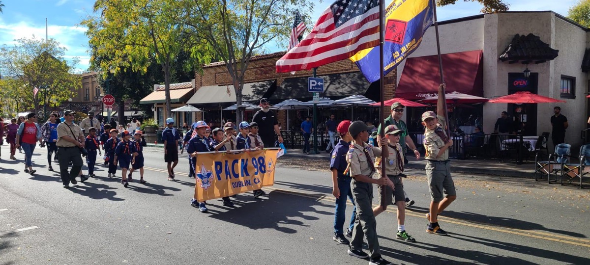Pack 986 marching in the Veterans Day Parade