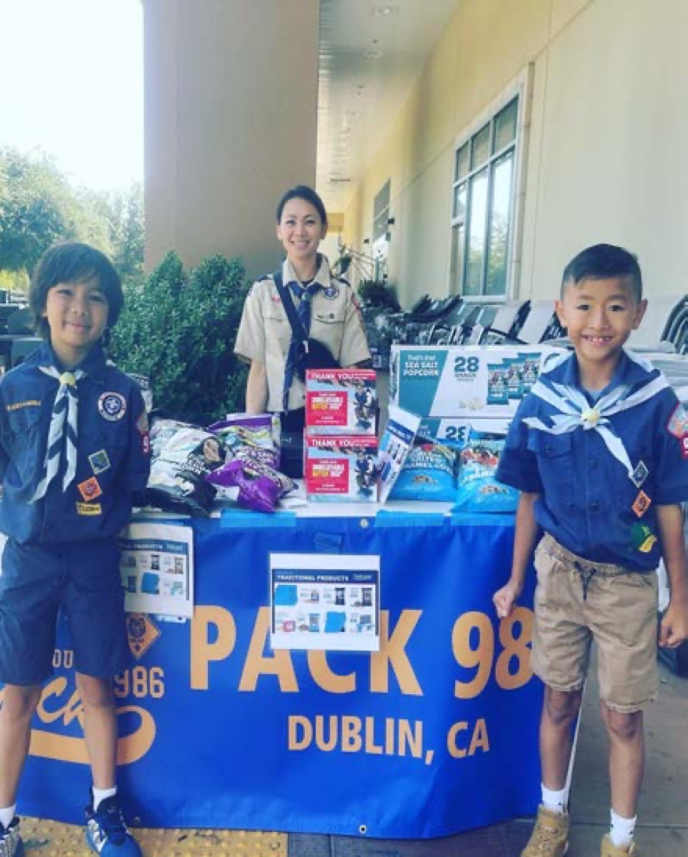 Scouts selling popcorn at a Pack 986 fundraiser