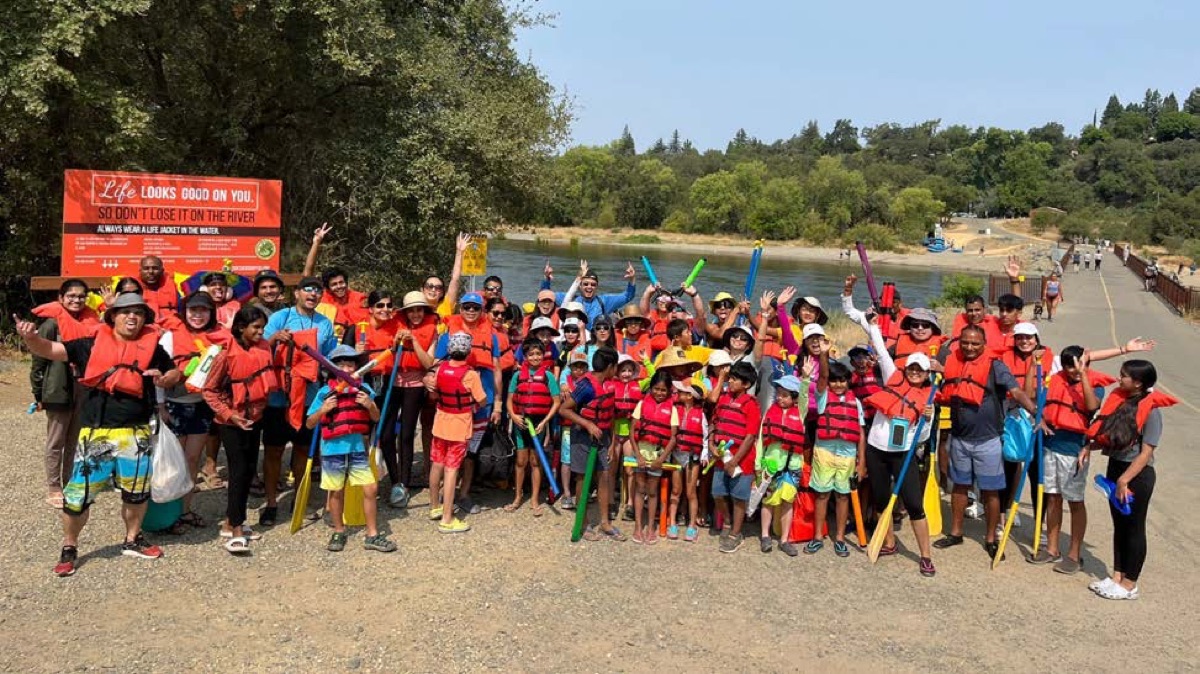 Pack 986 families river rafting together